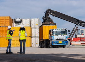 Normal_two-female-workers-oversee-container-loading-opera-2025-07-06-05-33-36-utc